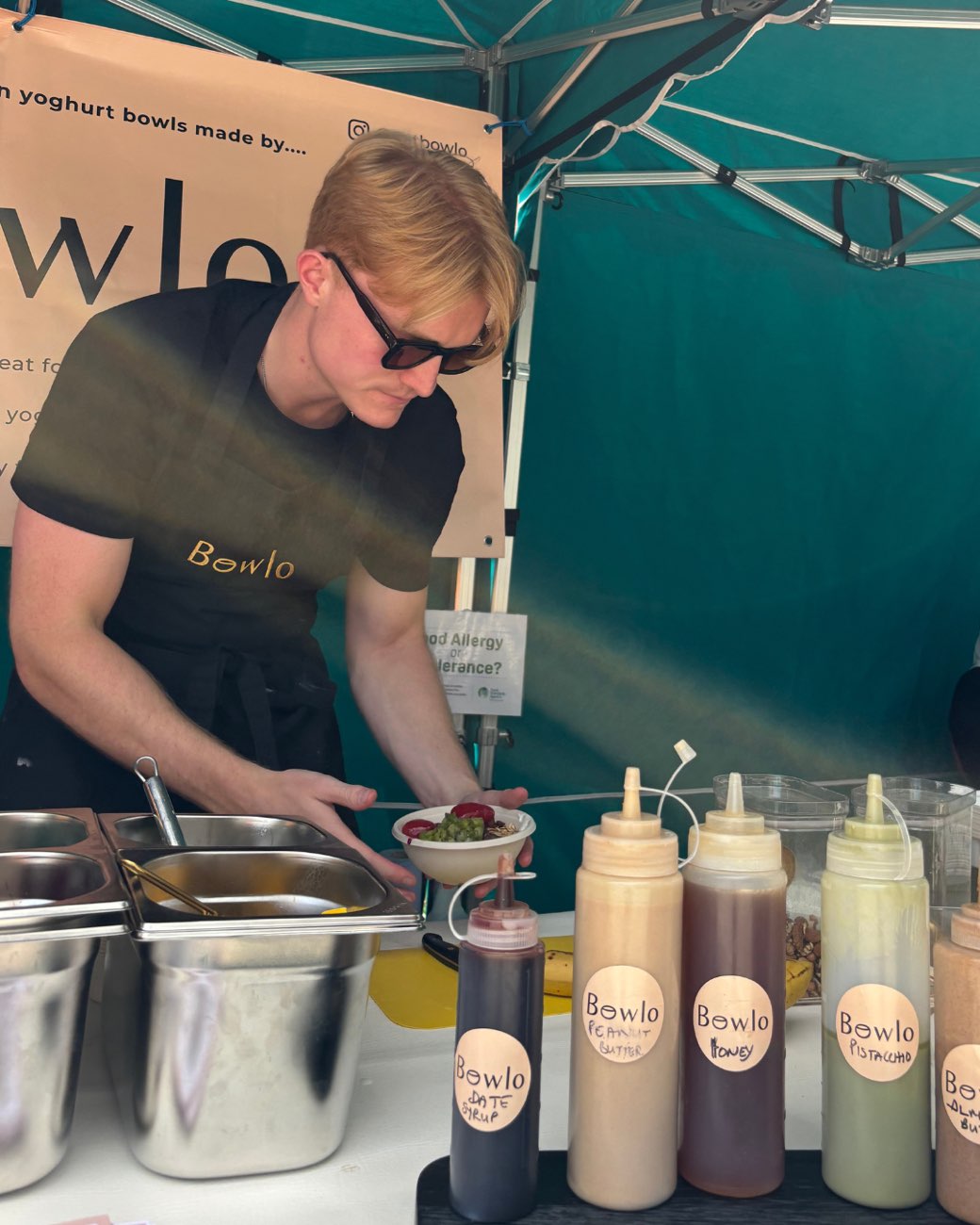 A bowl being built to order at the stall