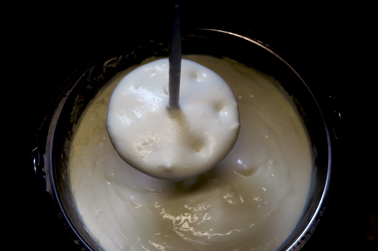 Yoghurt being stirred in the vat